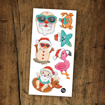 Tatouages - Le Père Noël à la plage
