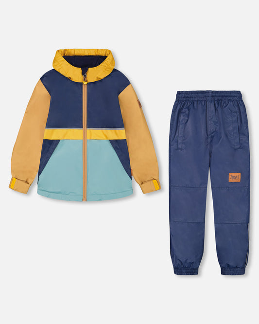 Ensemble deux pièces mi-saison avec manteau à capuche et pantalon blocs de couleurs marine, bleue et jaune
- F30W54-479 - 2 à 8 ans