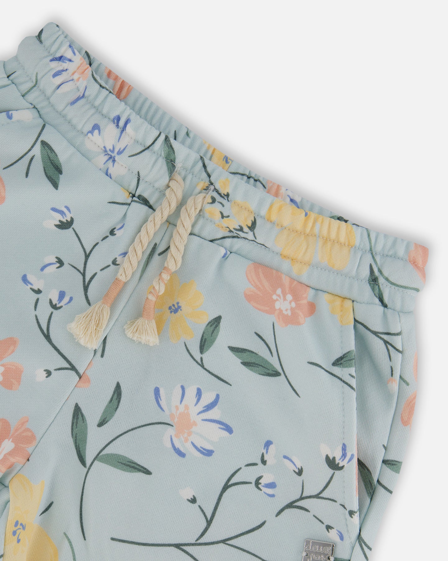 Short bleu clair avec imprimé de fleurs romantiques en coton français
- F30H25-028 - 3 à 12 ans